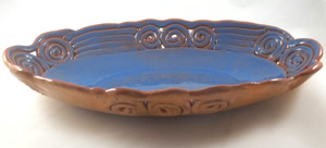 Hand-made slab and coil pottery fruit bowl made with plaster oval hump mold. (Sample)
