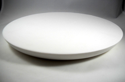 Plaster mold for making ceramic plates. 