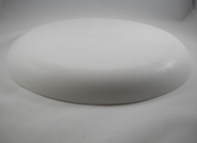 Plaster drape mold for making pottery plates. Mold is shown inverted. 