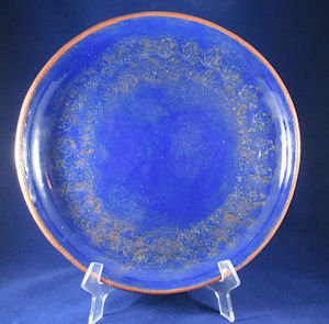 Pottery plate made on plaster mold with earthenware slab, low fire glaze