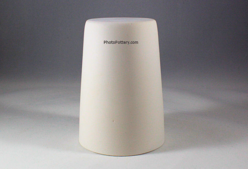 Plaster drape mold for making small ceramic cups, mugs, containers. Mold shown inverted.