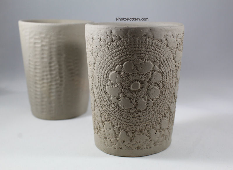 Pottery cups hand-built on plaster drape mold using slabs with slip and score. Porcelain, greenware.