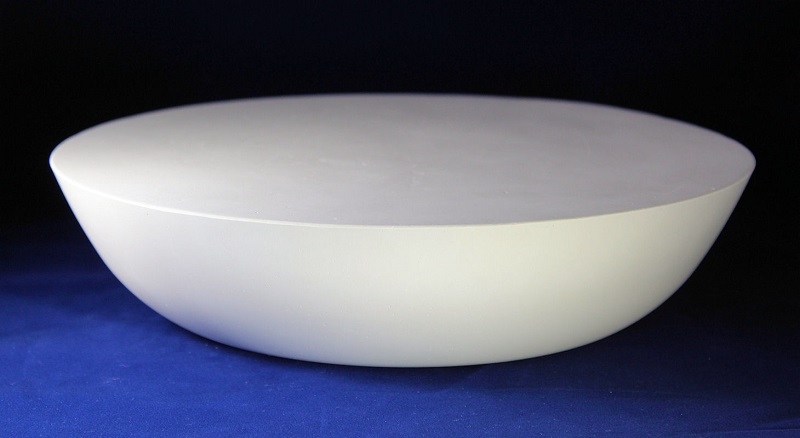 Plaster wide round hump mold for making large pottery decorative and functional bowls. Mold upright, similar to bowl in use.