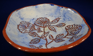 Small ceramic bowl made using round plaster hump mold. (Sample)